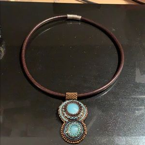 Brown leather necklace w/bead embroidered pendant